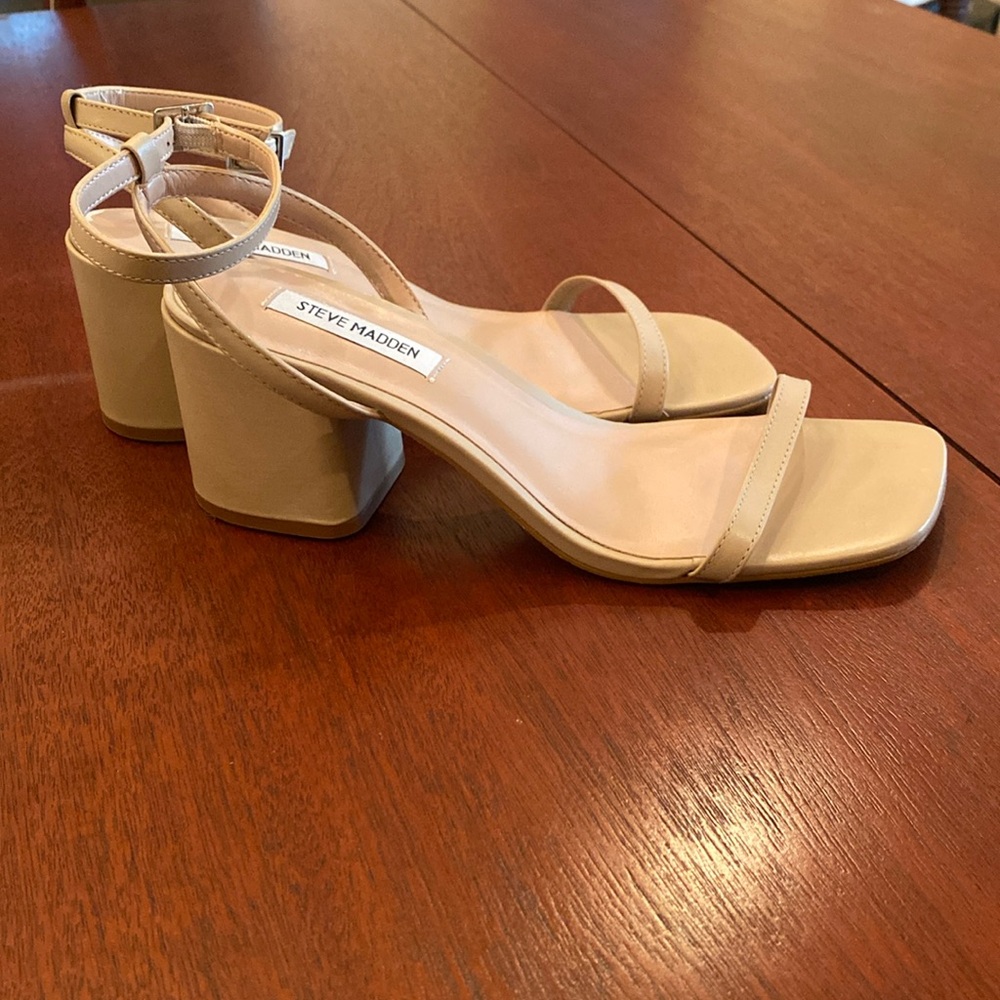 STEVE MADDEN:  super stylish, wear-with-anything chunky tan sandals.